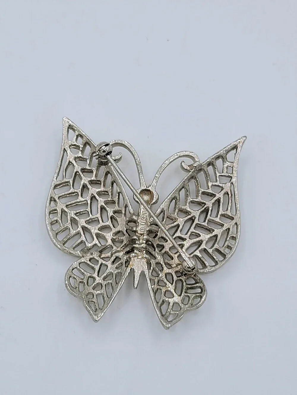 Avon Butterfly Brooch Two Tone Gold Silver Openwork Blue Rhinestone Eyes Vintage